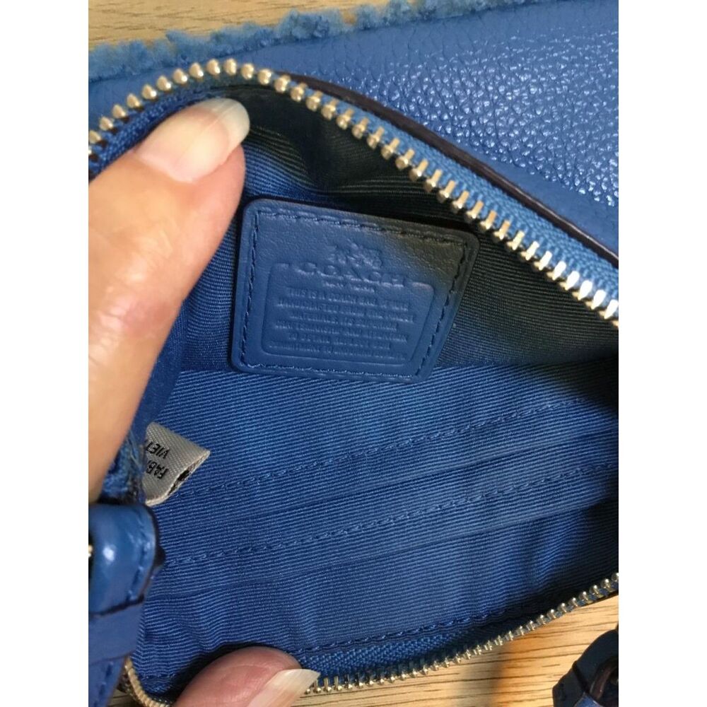 Coach Pebbled Leather Wristlet with Shearling Pom Pom and Trim - Picture 8 of 8